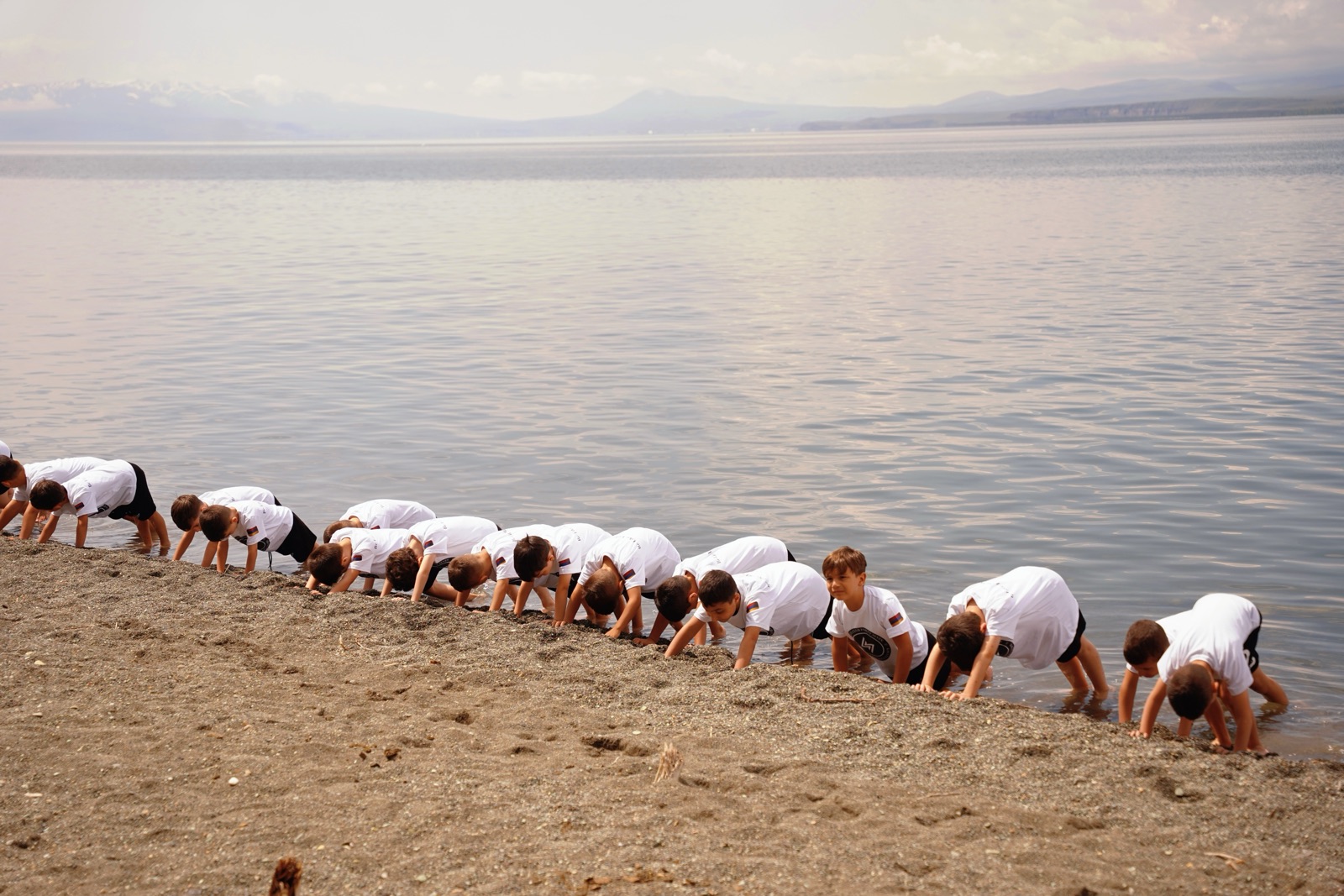 Students training on the shore of Lake Sevan