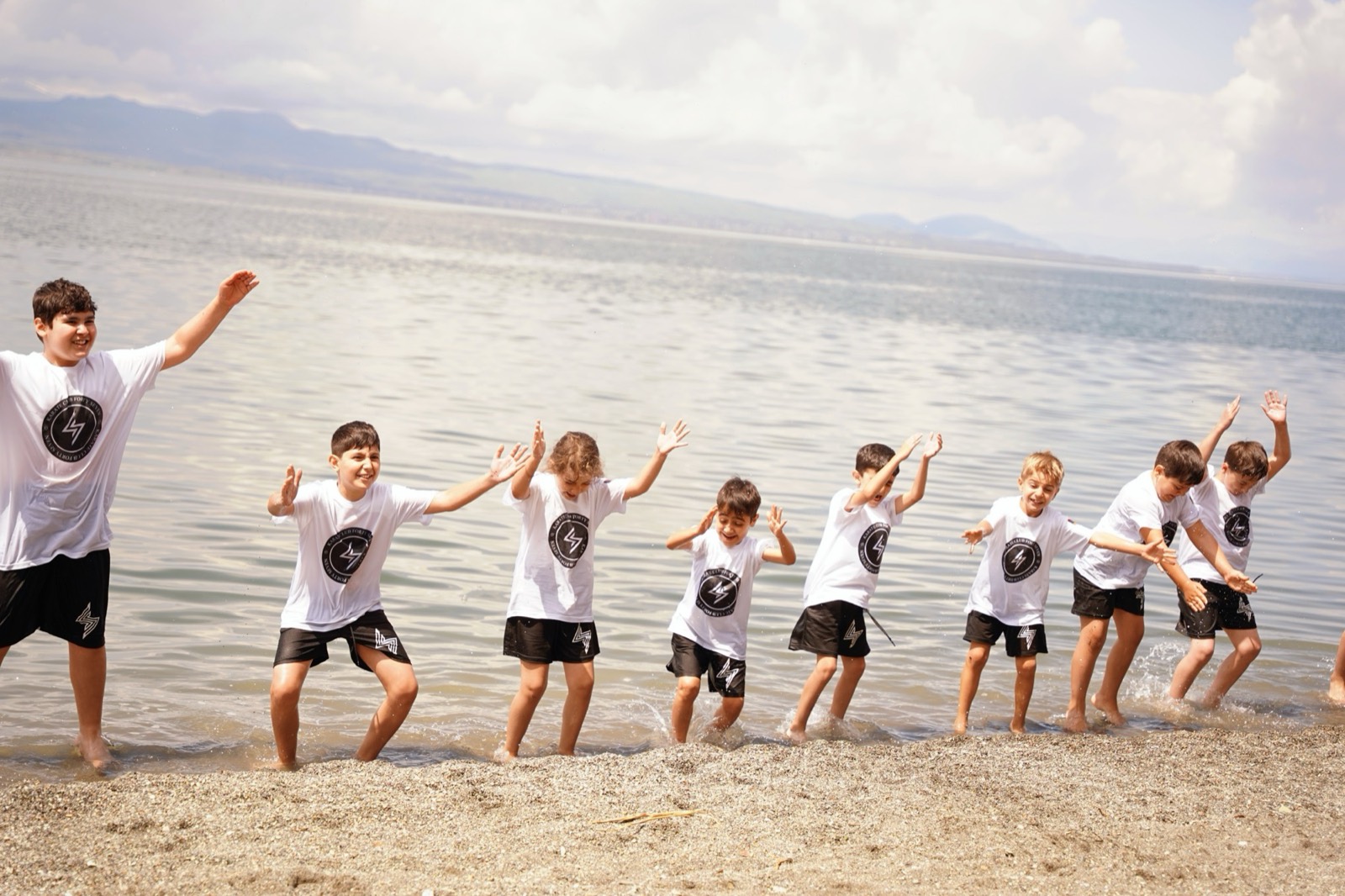 Students on the shore of Lake Sevan