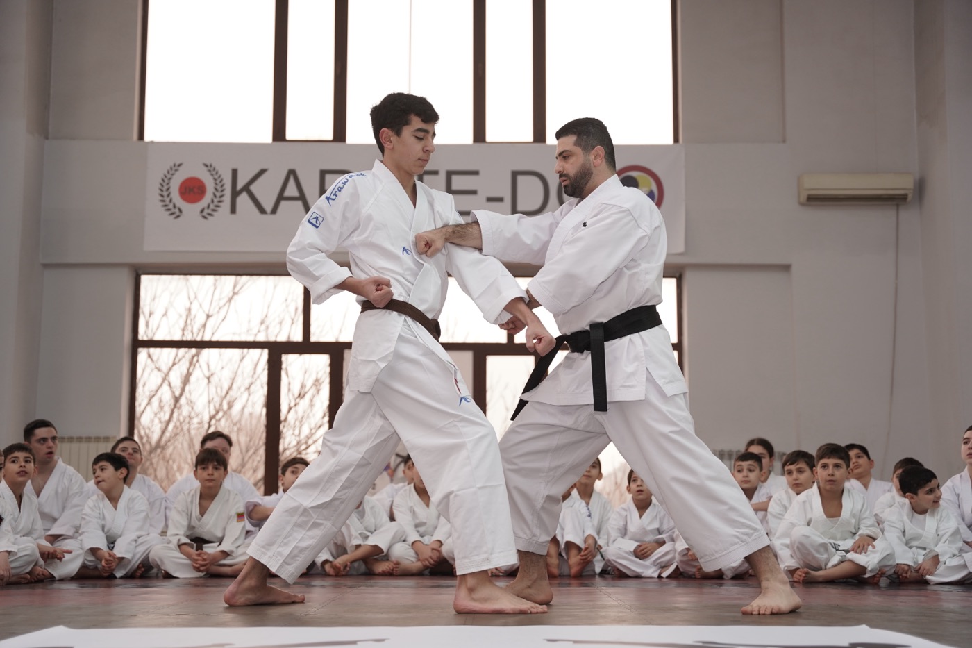 Coach Zhirayr Petrosyan demonstrating technique