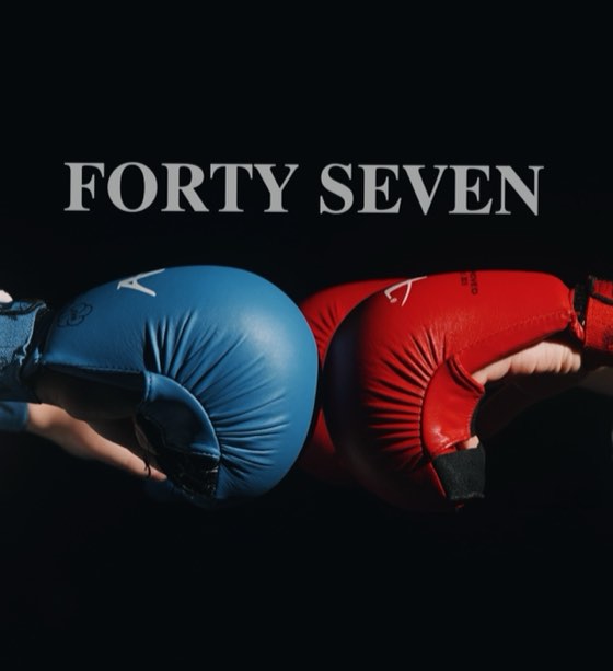 Forty Seven red and blue gloves