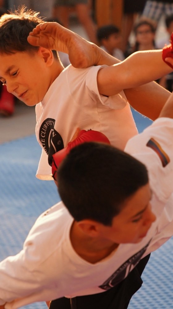 Student wearing a glove at training