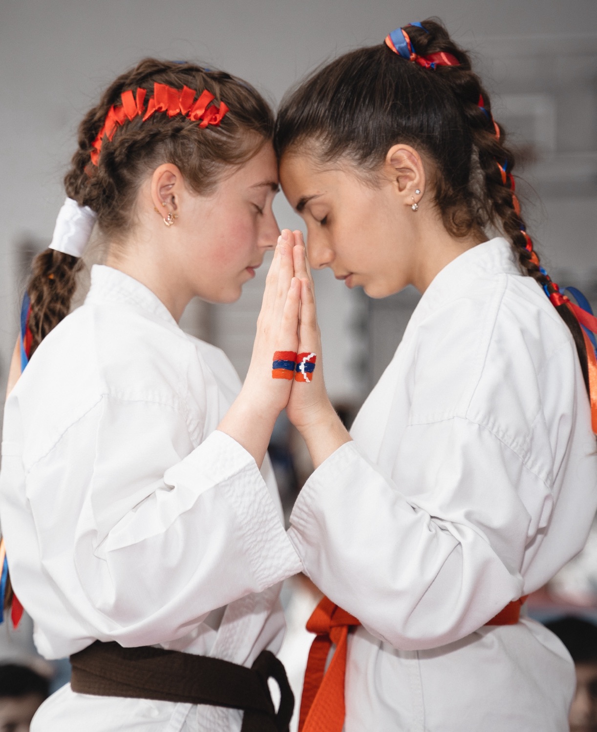 Two students greeting each other with respect